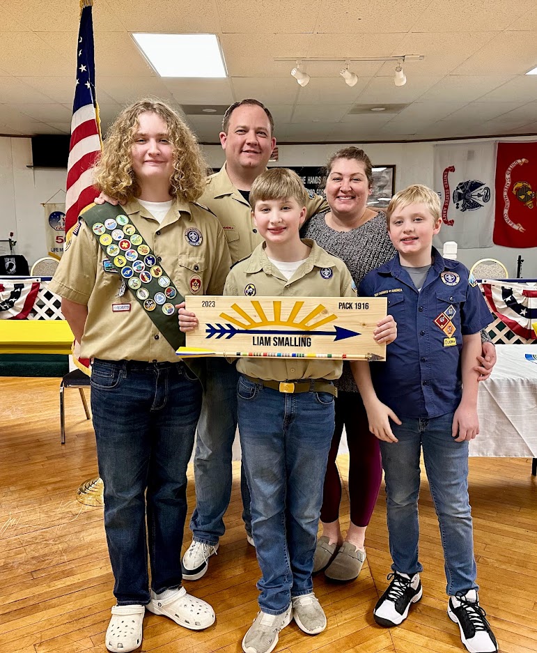 Helping One Guy Honors Jon Smalling with his wife Ashlyn and sons at a family scouting event