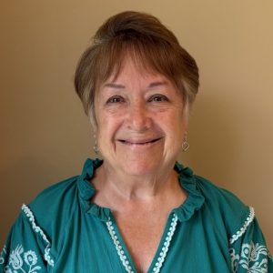 Becky Healy, Helping One Guy Board Member, committed to supporting families in crisis.