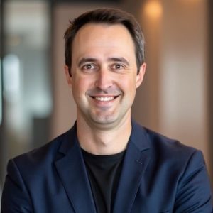 Chris Kanoy, Helping One Guy Board Member, committed to supporting families in crisis.